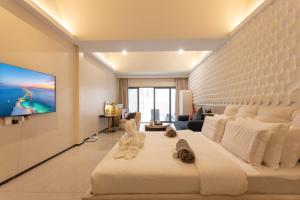 Televiisor ja/või meelelahutuskeskus majutusasutuses YUSU Hotel 羽宿酒店