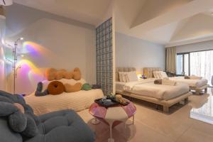 Voodi või voodid majutusasutuse YUSU Hotel 羽宿酒店 toas