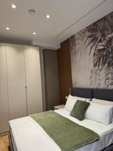 Ένα ή περισσότερα κρεβάτια σε δωμάτιο στο ABC Apartments