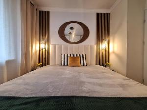 Ένα ή περισσότερα κρεβάτια σε δωμάτιο στο Green Irene