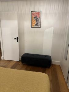 Ένα ή περισσότερα κρεβάτια σε δωμάτιο στο Joli appartement à Talence