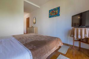Postel nebo postele na pokoji v ubytování Apartments in Crikvenica 39516