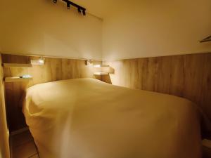 Postel nebo postele na pokoji v ubytování Casa Brunello + 15 fotografií