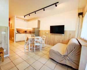 TV a/nebo společenská místnost v ubytování Casa Brunello