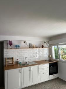 Kuchyň nebo kuchyňský kout v ubytování Apartment Čulić