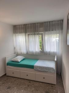 Postel nebo postele na pokoji v ubytování Apartment Čulić
