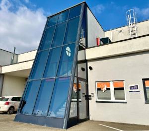 a glass door on the side of a building at Kobra Room, 4 Personen in Spielberg