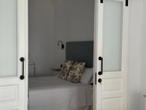 Postel nebo postele na pokoji v ubytování Apartamento Casa Nela