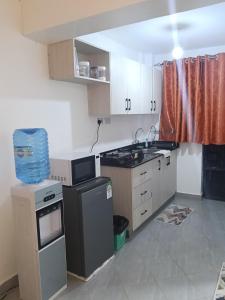 Una cocina o cocineta en AA Suites