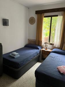 Postel nebo postele na pokoji v ubytování Villa Herrero + 53 fotografií