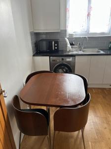 Η κουζίνα ή μικρή κουζίνα στο Flat +6 φωτογραφίες