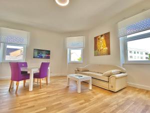 Uma televisão e/ou sistema de entretenimento em Steiner Residences Mödling