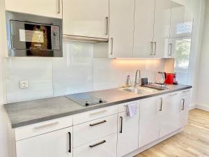 A cozinha ou kitchenette de Steiner Residences Mödling