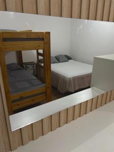 Giường trong phòng chung tại Guyama Apart 2