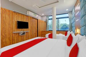 TV a/nebo společenská místnost v ubytování Hotel O Reet Villa