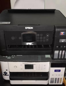 a bergson printer is sitting on top of avisor at Hospedaje Los Buenos Aires in Santa Ana
