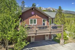 a house with a large deck on the side of it at Highfield Trail home in Breckenridge