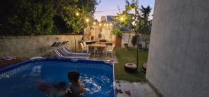 Πισίνα στο ή κοντά στο Garden Oasis