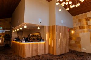 a restaurant with a counter in a room at Prospect Hotel Motel in Blacktown