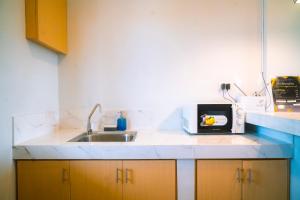 Η κουζίνα ή μικρή κουζίνα στο The Grounds Hotel +4 φωτογραφίες