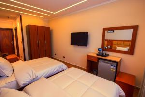 Letto o letti in una camera di THree PYramiDs & SPhinX HoTeL