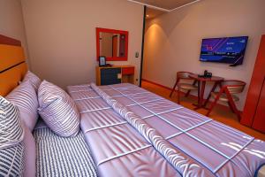 Letto o letti in una camera di THree PYramiDs & SPhinX HoTeL