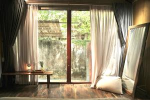Ein Bett oder Betten in einem Zimmer der Unterkunft Cat Homestay