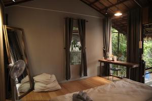 Ein Bett oder Betten in einem Zimmer der Unterkunft Cat Homestay