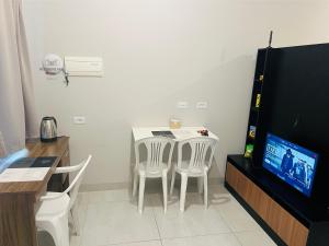 TV a/nebo společenská místnost v ubytování Residencial Yama