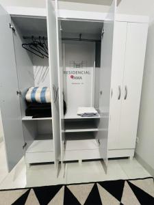 Postel nebo postele na pokoji v ubytování Residencial Yama