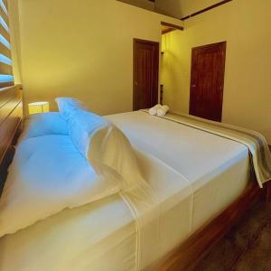 Giường trong phòng chung tại Mar Om +30 ảnh