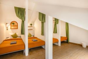 Katil atau katil-katil dalam bilik di Huma Yogyakarta Hostel