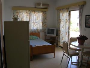 TV a/nebo společenská místnost v ubytování Marios Apartments