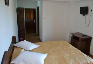 Postel nebo postele na pokoji v ubytování Hotel Corsar