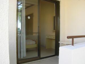 Postel nebo postele na pokoji v ubytování Marios Apartments