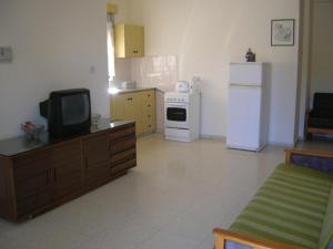 Kuchyň nebo kuchyňský kout v ubytování Marios Apartments
