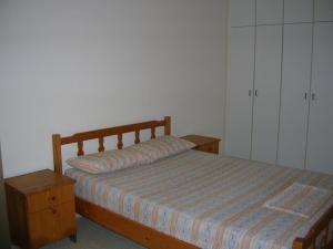 Postel nebo postele na pokoji v ubytování Marios Apartments