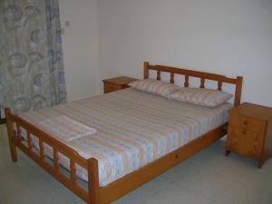 Postel nebo postele na pokoji v ubytování Marios Apartments