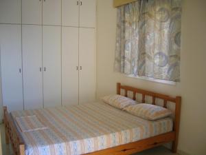 Postel nebo postele na pokoji v ubytování Marios Apartments