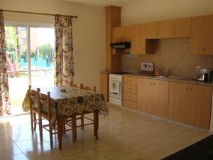 Kuchyň nebo kuchyňský kout v ubytování Marios Apartments