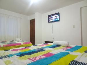 Postel nebo postele na pokoji v ubytování Hotel CasaBlanca"Tablon de miraflores"