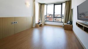 Postel nebo postele na pokoji v ubytování Mstay Hotel