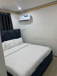 Kama o mga kama sa kuwarto sa Dee OS' Hotel +3 photo