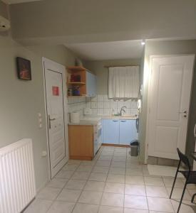 Kuchyňa alebo kuchynka v ubytovaní Mavretas Apartments 3