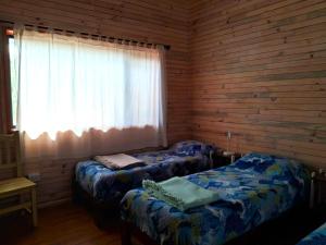 Postel nebo postele na pokoji v ubytování Cabaña Aida Epuyén