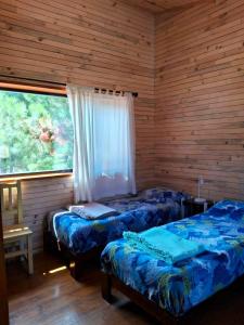 Postel nebo postele na pokoji v ubytování Cabaña Aida Epuyén