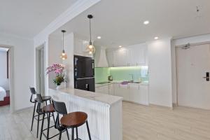 Η κουζίνα ή μικρή κουζίνα στο De' Lora GoldCoast Apartment +219 φωτογραφίες