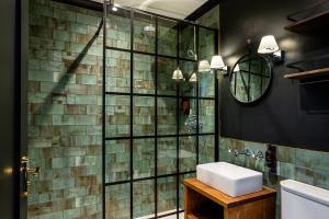 a bathroom with a sink and a glass shower at Rob Roy - Self Check-In Boutique Accommodation in Berwick-Upon-Tweed +62 photos