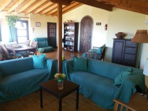 The lounge or bar area at Casa Vista Palmeral