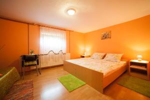 Postel nebo postele na pokoji v ubytování Apartment Tomašević